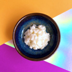 Picture of Milk kefir grains in a lovely bowl in front of a beautiful background