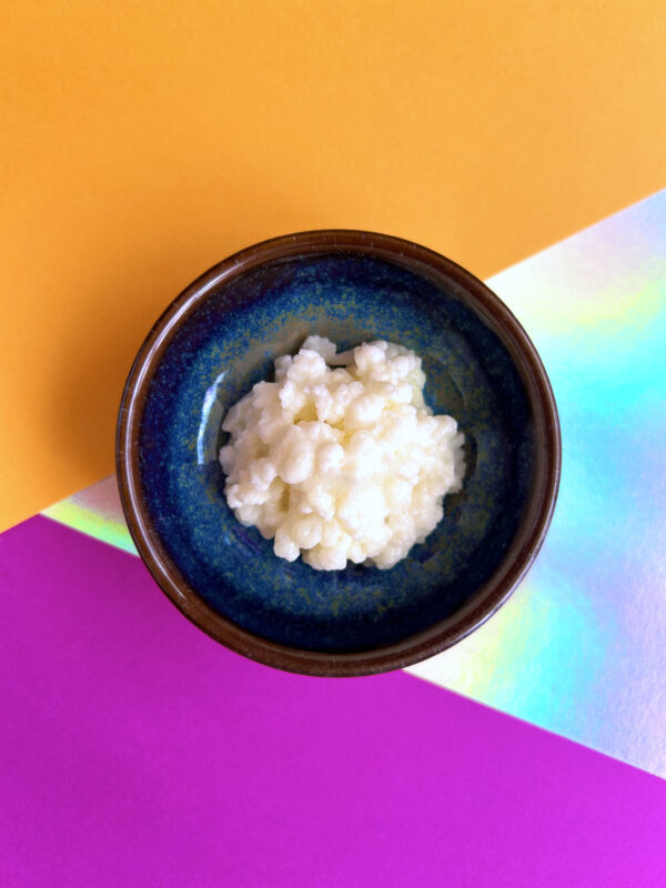 Picture of Milk kefir grains in a lovely bowl in front of a beautiful background
